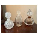3 perfume bottles