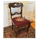 Antique chair with needlepoint seat