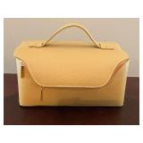 Estee Lauder makeup bag.
