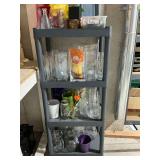 Plastic shelf and vases, decorative rock, etc.