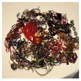 Costume jewelry, mostly necklaces.