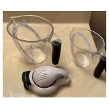 2-cup and 4-cup OXO measuring cups, egg slicer