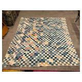 Nine patch vintage quilt, hand quilted, shows lots of wear