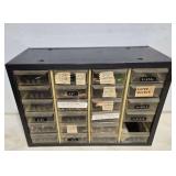 Small utility cabinet with reloading supplies