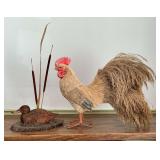 Carved duck and natural fiber rooster