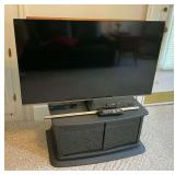 Samsung 49" flatscreen television with remote, Sony Blu-Ray player with remote