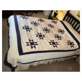 Blue and white star quilt