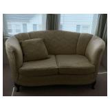 Vintage yellow loveseat with throw pillow