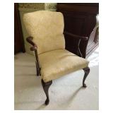 Upholstered arm chair with wooden arms