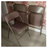 4 beige Cosco folding chairs