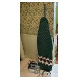 Vintage ironing board, Rowenta and Sunbeam steam irons.