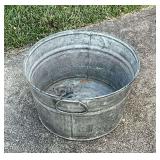 Small galvanized tub, 14" W x 8" D.