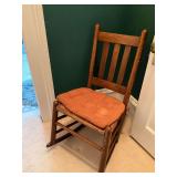 Antique sewing rocker with cane seating