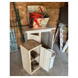 Assorted extension cords, base cabinet