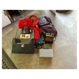 Old Polaroid cameras, duffle bags