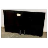 Hisense 57" Flat Screen Television with Two Remotes