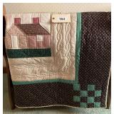 Handmade Quilt Featuring House Block and Geometric Patterns