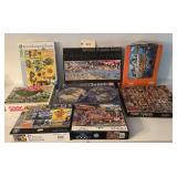 Assorted Jigsaw Puzzles Featuring Ravensburger, Educa, Heye, and Buffalo Brands