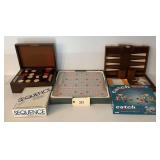 Assorted Board Games Lot Including Scrabble, Sequence, Catch Phrase, and Wooden Backgammon Sets