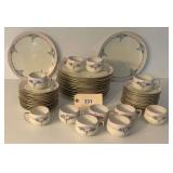 Porcelain Dinnerware Set with Floral Motif and Gold Trim