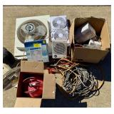 Assorted Household Items Including Fans, Helium Tank, Jump Cables, and Electronics