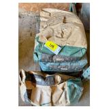 Bags of Bentonite Granular Performance Minerals and Agri-Flex Animal Feed Grade