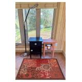 Black Cabinet, Salmon Table, Floor Lamp, Rug and Candles