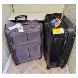 Two Rolling Suitcases: One iFLY and One Samsonite