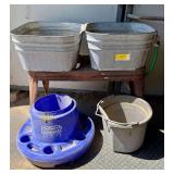 Two Galvanized Tubs on Metal Stand with Additional Buckets and Cool Float Feeder