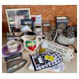 Assorted Household Items Including Iron, Dishes, and Decor