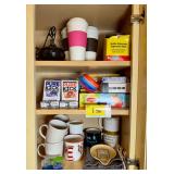 Kitchen Cabinet Assortment Including Mugs, Drink Mixes, Travel Tumblers, and Accessories