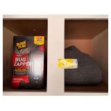Black Flag Bug Zapper and Gray Fleece Blanket