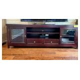 Dark Wood Media Console with Glass Doors and Storage Drawers
