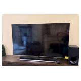 65' Samsung Flat Screen TV with Sound Bar, Subwoofer, Roku Unit and Remotes
