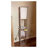 Wooden Floor Lamp with Integrated Storage Shelves and Decorative Items