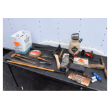 Machetes, Hand Saws, Windshield Wipers, Ice Scrapers, Magnet on a Stick, 1 Gallon Hand Sprayer Battery Terminals, Echo Tri-Cut Blade, Splitting Maul Head, and Misc.