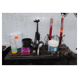 2XS Sport Golf Bag Cart, Minn Kota Trolling Motor, (2) Candle Decorations, 12 Inch Railroad Tie Anvil, Golfsmith 5 Wood, Wash Bucket, (2) Boxes of XL Rubber Gloves, and Misc.