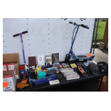 Razor Electric Scooter, Razor Scooter, Huffy Scooter, (3) Greyhound Bus Model Buses, (3) Biker Helmets, Books, and Misc.
