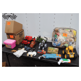 Little Tikes Construction Vehicle, Chevy Suburban Toy Car, Fire and Rescue Toy Truck, Mine Sweeper Toy Truck, Action Figures Legos, Beanie Babies, Nerf Gun, and Misc.