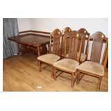 Dining Room Table with (4) Cushioned Chairs, and (1) Captain's Chair