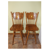 (2) Oak Swivel Bar Stools