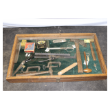 Wooden Glass Top Display Case, Wooden Mallet, Hatchet, Brass Mallet, Ball Peen Hammer, C-Clamps, Coca Cola Bottle Opener Pocket Knife, Files, Winchester Scissors, Sure Foot Heels, Chatillon Scale, and