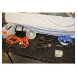 Hanging Light, Flood Light, Jumper Cables, Electrical Cords, 50 Ft. 3/8 Inch Campbell Hausfeld Air Hose, 1 7/8 Inch Trailer Ball, and Misc.