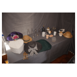 Hat Boxes, Decorative Hats, Placemats, Globes, Blue Glass Canisters with Corks, Electric Iron, and Misc. Decorations