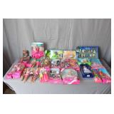 Rudolph The Island of Misfit Toys Figurines, Saddle Tramp Bronco 4x4 Model Car, Cabbage Patch Garden Fairy Doll, University Barbie, 35th Anniversary Barbie, Hula Hair Barbie, Ocean Friends Barbie, and