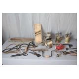 Kraut Cutter, Hand Sickle, (2) Levels, (2) Brass Blow Torches, Hand Drill, Oil Cans, Ice Block Tongs, and Misc.