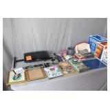 Picture Frames, Various Artist CDs, Paper Towel Holder/Shelf, Wooden Decorative Clock, Hair Dryer, Folding Cushioned Bench, and Misc.