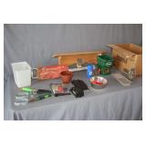 30 in. Wooden Shelf, Golf Ball Shag Bag, Scotts Handheld Spreader, Hooded Adult Raincoat, Stainless Bowl, Cast Iron Wall Mounted Match Box, and Misc.