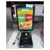 Gehl’s Nacho/Chili Sauce machine-used less than a year ago.  No preview.  Pickup Ice and Events Center