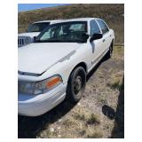 2009 Ford Crown Victoria, Vin#2FAHP71V29X101045, odometer reads 125,107, locks are drilled, hail, heavily broken and cracked windshield, peeling paint.  See description for additional information.  Pr